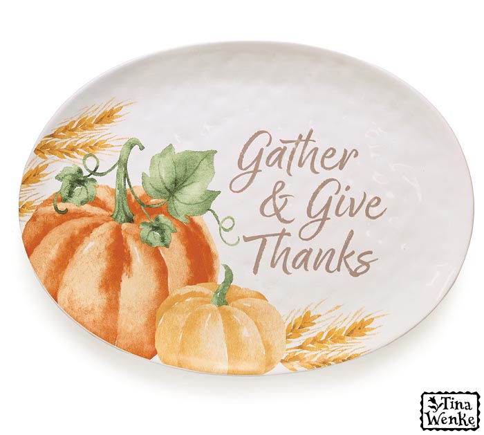 White ceramic outlet pumpkin that says gather