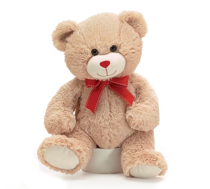 teddy bear with red bow tie