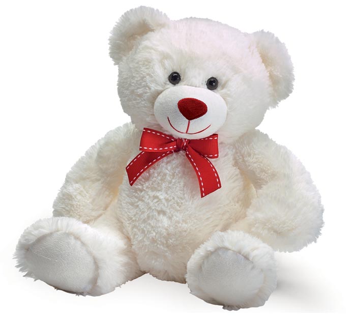 white teddy bear with red bow