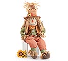 SCARECROW WITH GREEN AND ORANGE CLOTHING